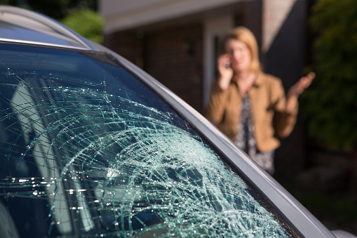 Woman calling for help after car accident